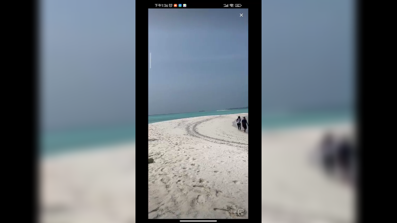 在海边游玩还可以放无人机拍摄婚纱美照